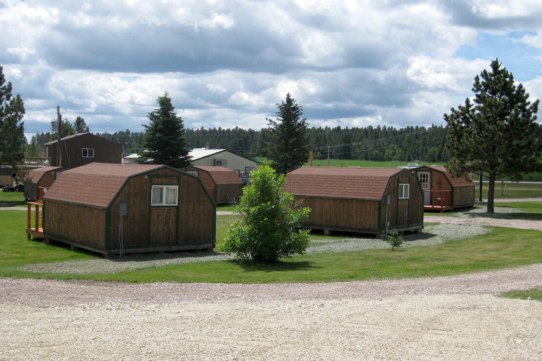 Custer Crossing Family Campground exterior photo of main building. 