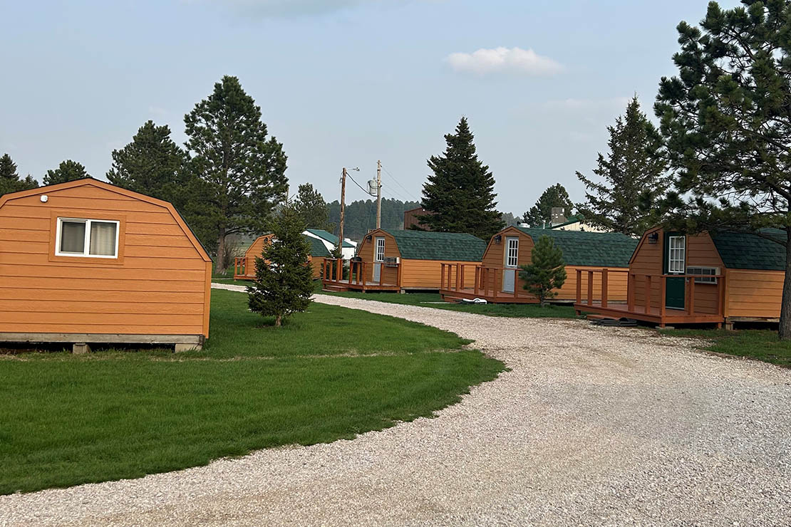 Custer Crossing Family Campground exterior photo of main building. 